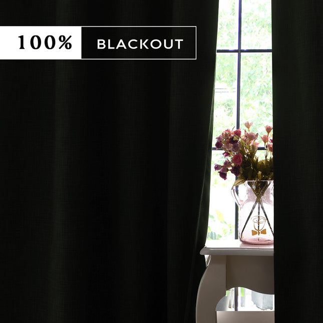 Grön mörkläggningsgardin med vävd struktur