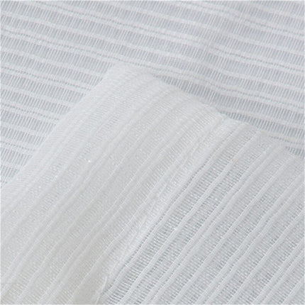 Vit voilegardin med vävd struktur