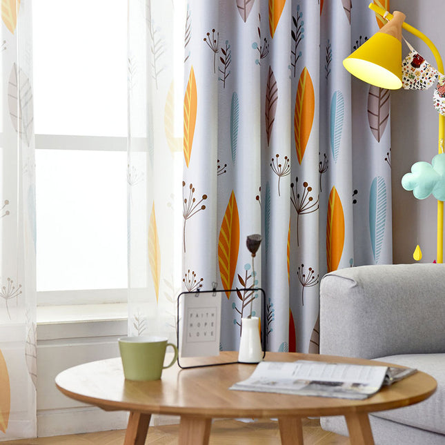 Mörkläggningsgardin med gula och orangea löv