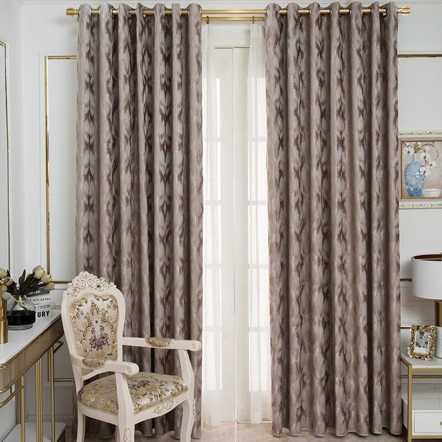 Taupe mörkläggningsgardin med abstrakt mönster