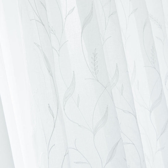 Voilegardin med diskret kvistmönster