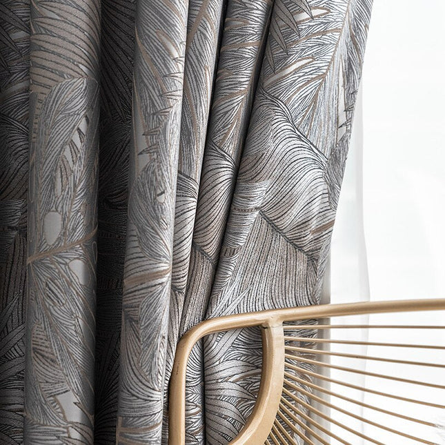 Mörkläggningsgardin Nirboa med lövmönster