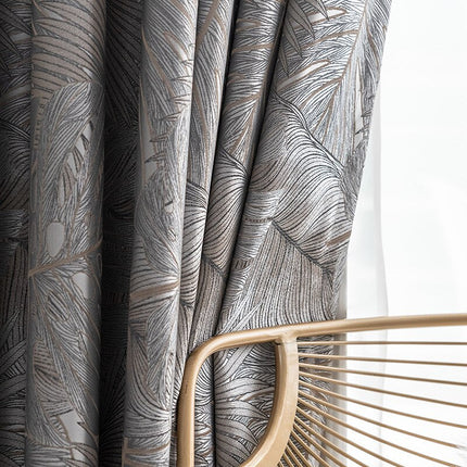 Mörkläggningsgardin Nirboa med lövmönster