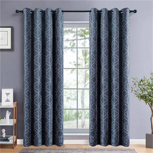 Mörkblå mörkläggningsgardin med geometriskt mönster