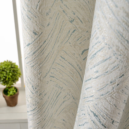 Texturerad mörkläggningsgardin med diskret mönster