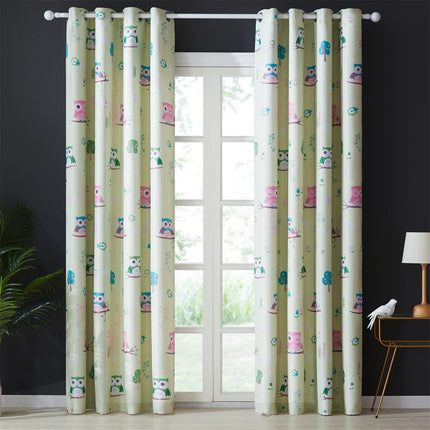 Krämfärgad mörkläggningsgardin med ugglor