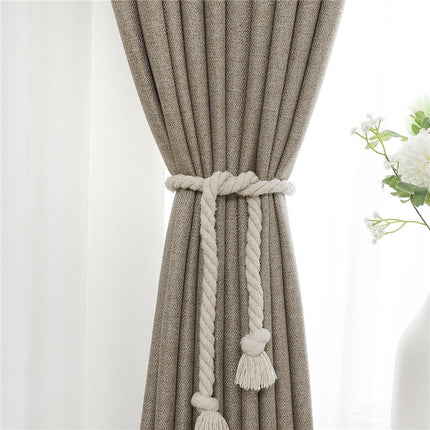 Mörkbeige gardin för vardagsrum och sovrum.