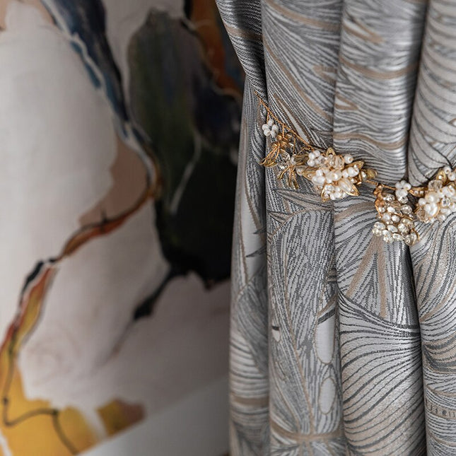 Mörkläggningsgardin Nirboa med lövmönster