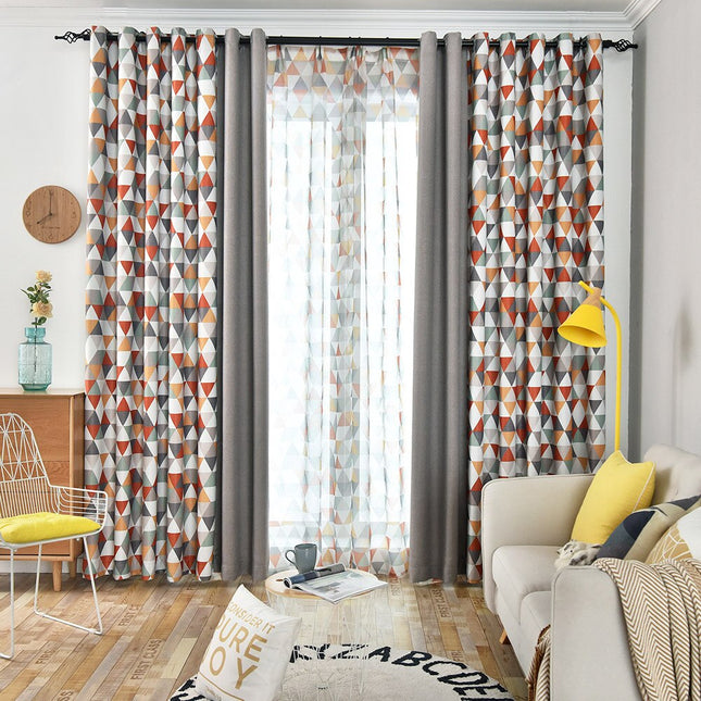 Mörkläggningsgardin med färgglatt geometriskt mönster