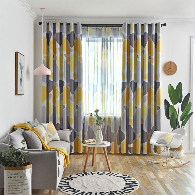 Mörkläggningsgardin med abstrakt mönster i gult