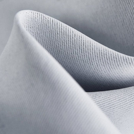 Enfärgad mörkläggningsgardin för total mörkläggning