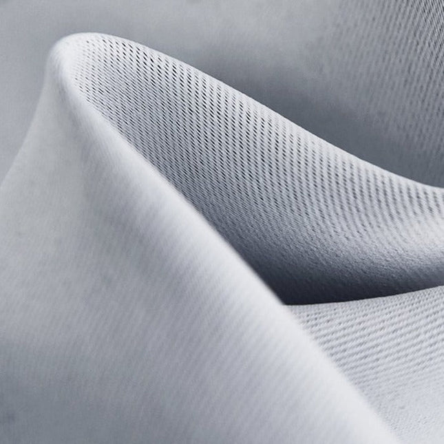 Enfärgad mörkläggningsgardin för total mörkläggning