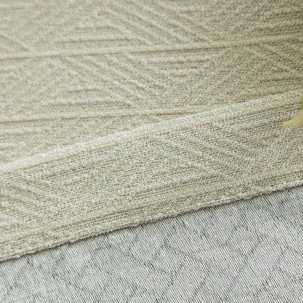 Beige mörkläggningsgardin med fiskbensmönster