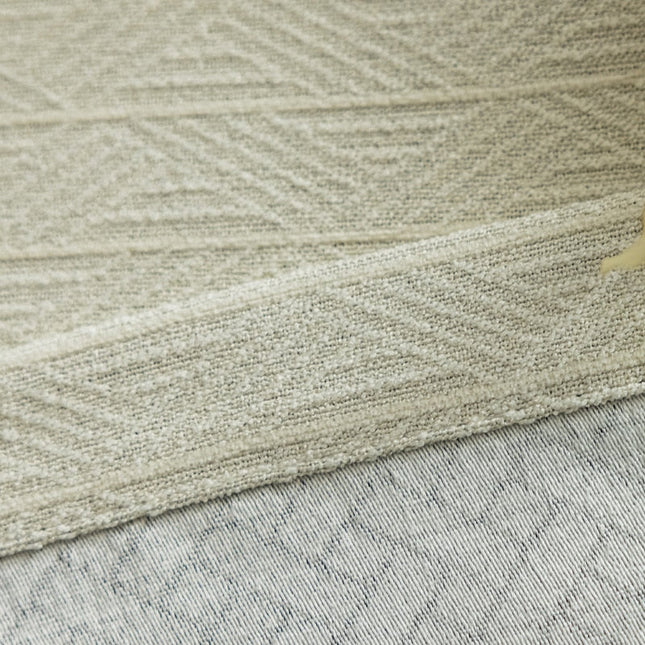 Beige mörkläggningsgardin med fiskbensmönster