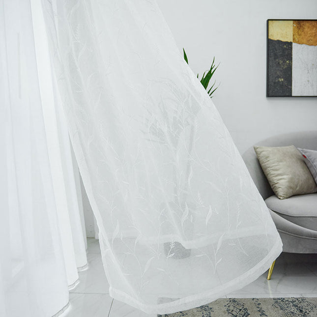 Voilegardin med diskret kvistmönster