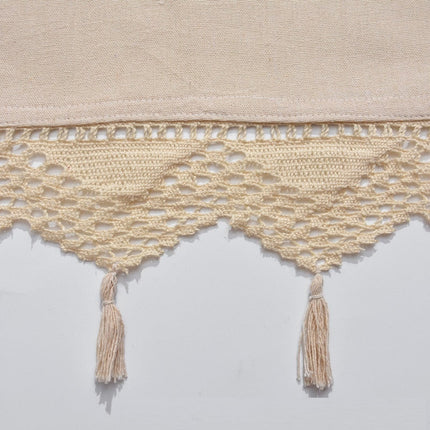 Beige gardinkappa i linne-look med tofsar