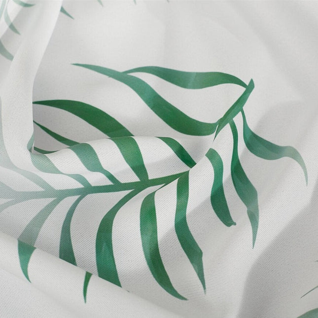 Gardin med tropiskt palmbladsmönster