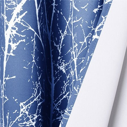 Mönstrad utomhusgardin med grenmotiv