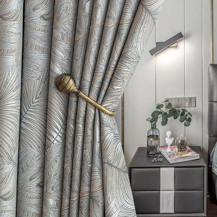 Mörkläggningsgardin Nirboa med lövmönster