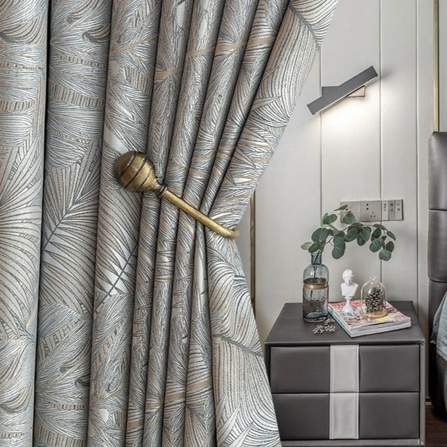 Mörkläggningsgardin Nirboa med lövmönster