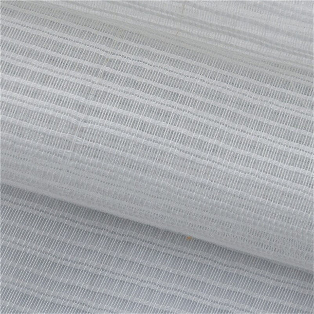 Vit voilegardin med vävd struktur