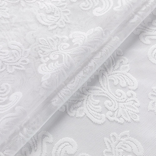 Tunn gardin med elegant damastmönster