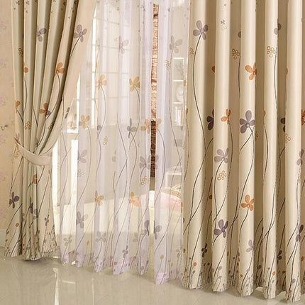 Elegant tunn gardin med blommor