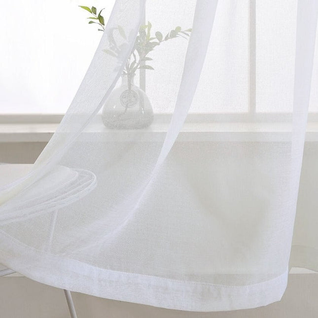 Ljusgrå utomhusgardin i skir linnestruktur