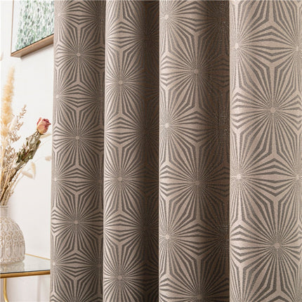 Brun gardin med geometriskt Art Deco-mönster