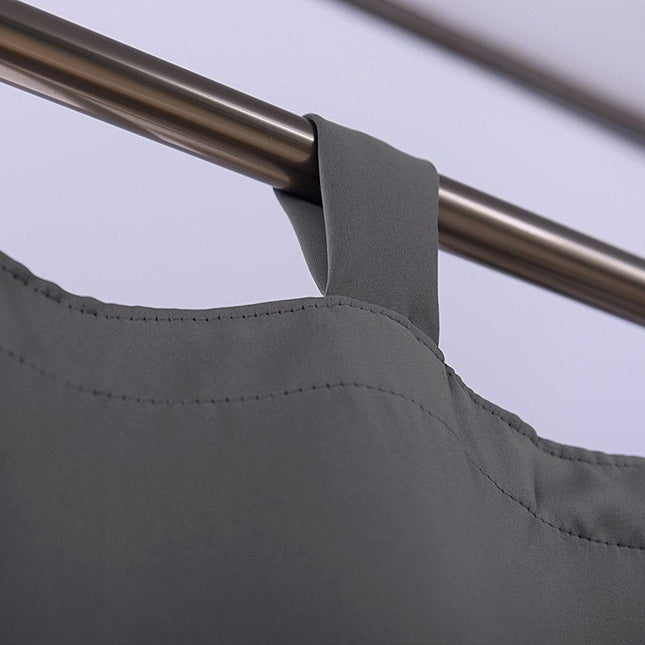 Mörkläggningsgardin med hällor för total mörkläggning