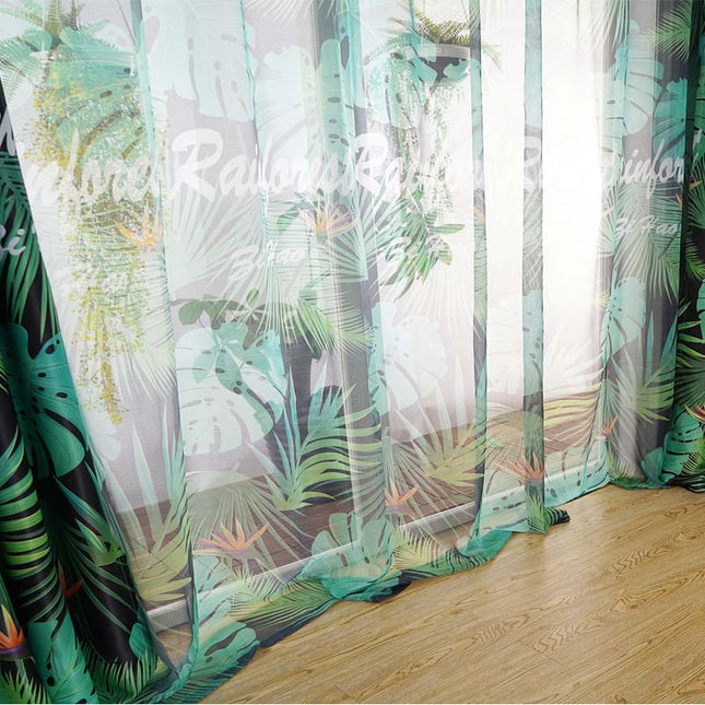 Dubbel gardin med tropiskt mönster