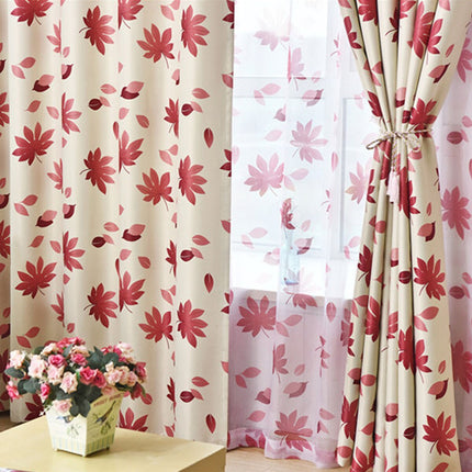 Mönstrad mörkläggningsgardin med lönnlöv