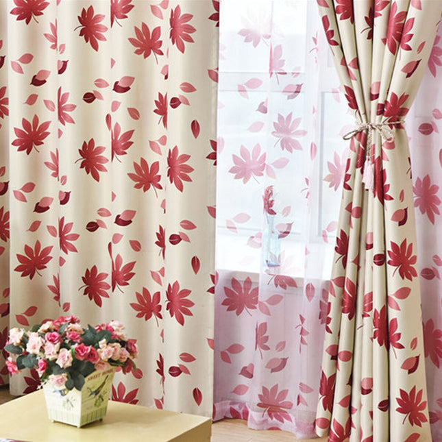 Mönstrad mörkläggningsgardin med lönnlöv