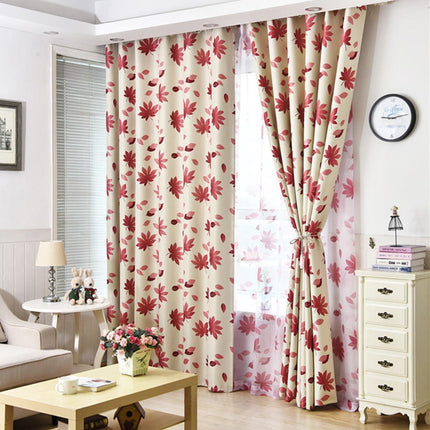 Mönstrad mörkläggningsgardin med lönnlöv