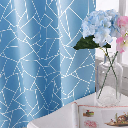 Mörkläggningsgardin med modernt geometriskt mönster