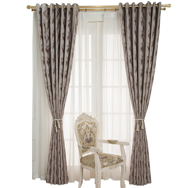 Taupe mörkläggningsgardin med abstrakt mönster