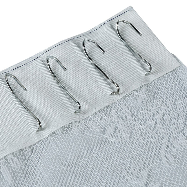 Vit romantisk spetsgardin med vågkant