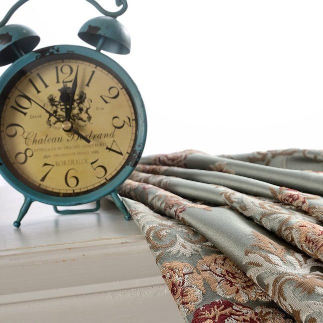 Mörkläggningsgardin i jacquard med blommönster