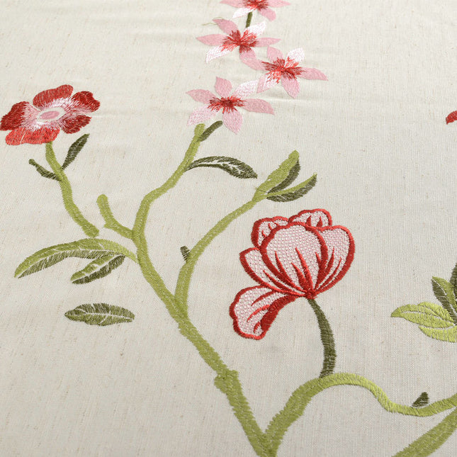 Gardin med broderade blommande grenar