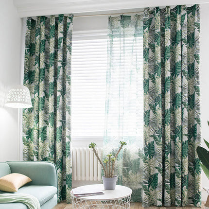 Tunn gardin med tropiskt palmbladsmönster