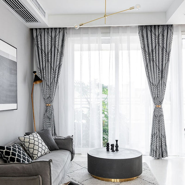 Mörkläggningsgardin med modernt lövmotiv