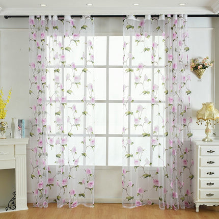 Tunn gardin med rosa blommönster