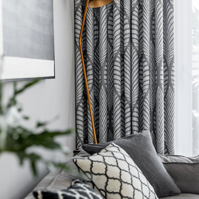 Mörkläggningsgardin med modernt lövmotiv