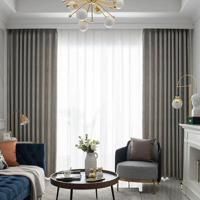 Mörkläggningsgardin Seki med diskret palmbladsmönster