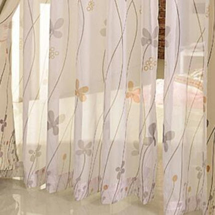 Elegant tunn gardin med blommor