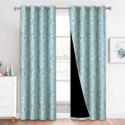 Mörkläggningsgardin med vackert blommönster.