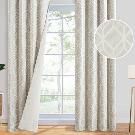 Beige mörkläggningsgardin med geometriskt mönster