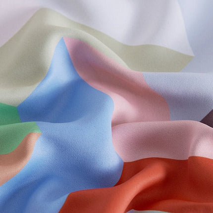 Utomhusgardin med färgglatt geometriskt mönster