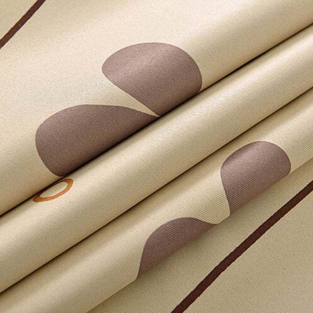 Mörkläggningsgardin med stiliserat blommönster