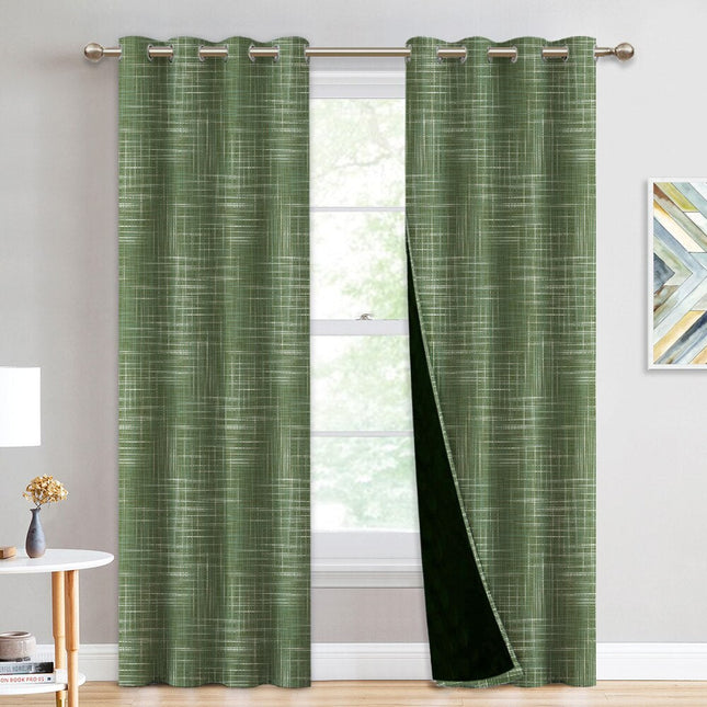 Grön mörkläggningsgardin med vävd struktur